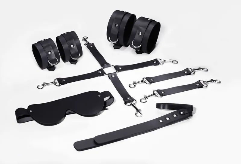 Набір Feral Feelings BDSM Kit 5 Black: наручники, поножі, хрестовина, маска, паддл