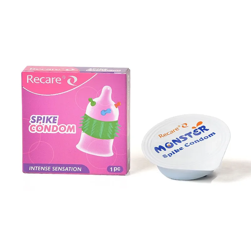 Насадка на член Recare Spike Condom Pink з кульками та рядами шипів